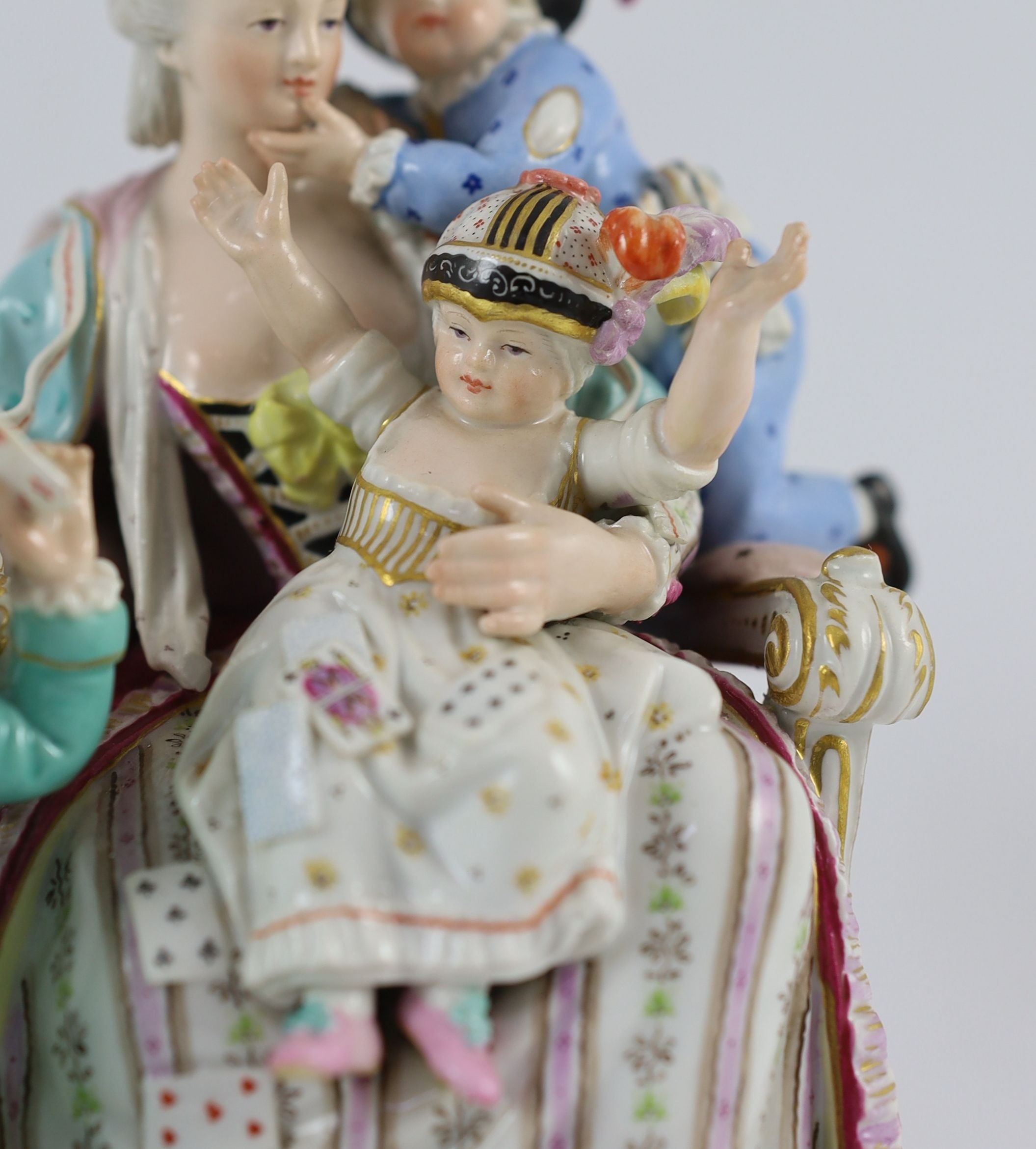 A Meissen group of the good mother, 19th century, after a model by Michel Victor Acier, 22 cm high
